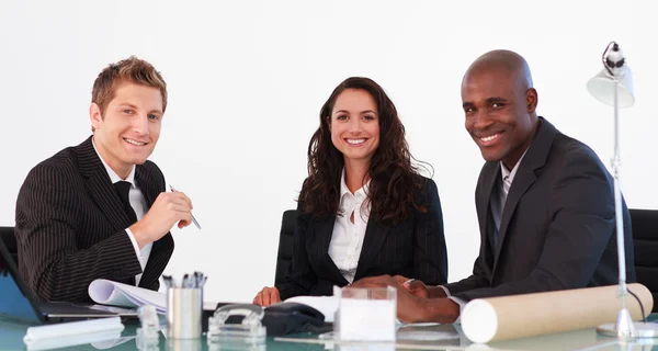 Business team in a meeting looking at the camera — Stock Photo, Image