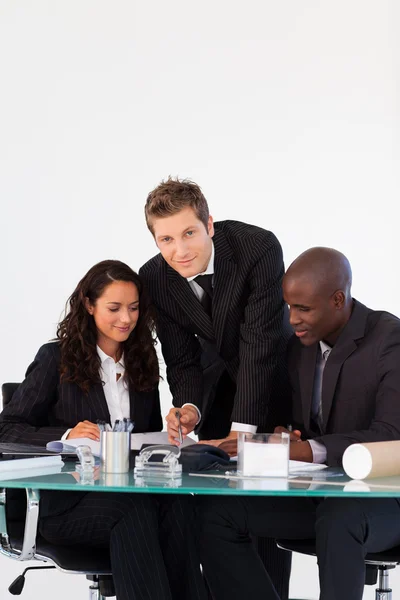Business team talking to each other in a meeting — Stock Photo, Image