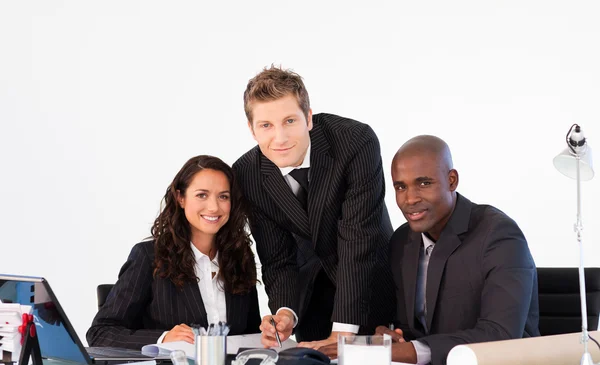 Business smiling to the camera in a meeting — Stock Photo, Image