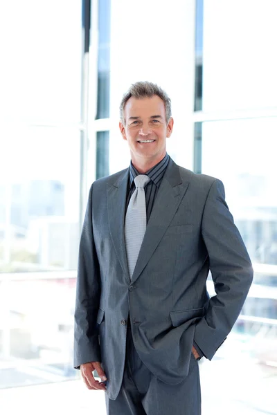 Smiling mature businessman in office — Stock Photo, Image