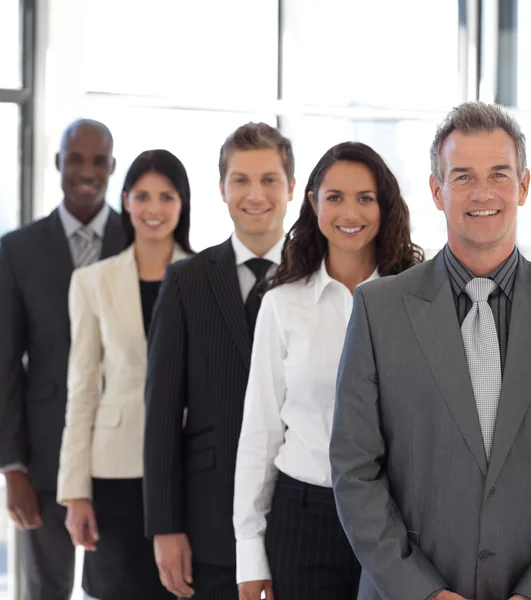 Businesspeople from different cultures looking at camera — Stock Photo, Image