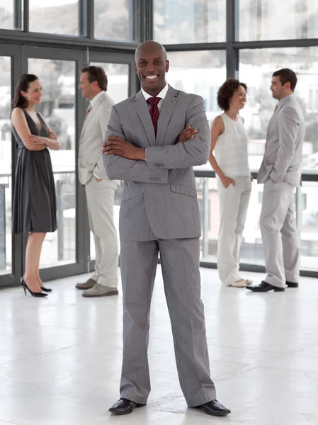 Afro-american male leader with his team — Stock Photo, Image