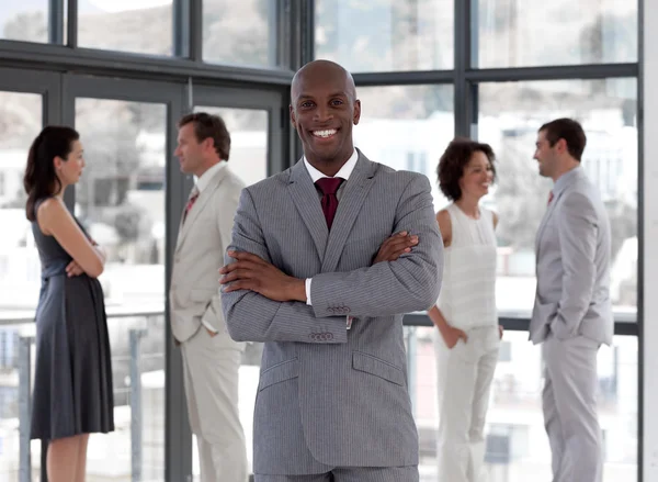 Afro-american male leader with his team — Stock Photo, Image