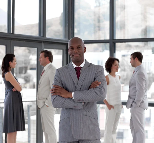 Afro-american male leader with his team — Stock Photo, Image