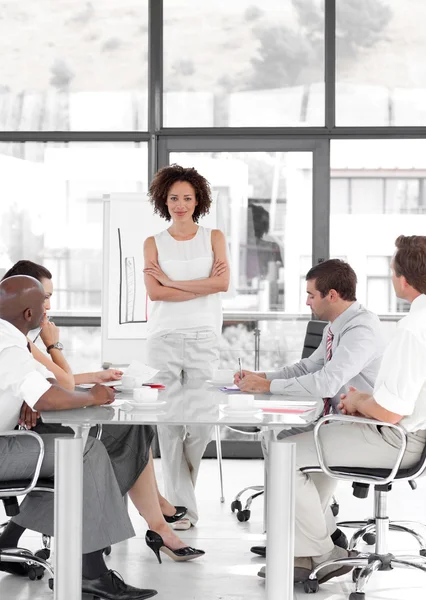Female business woman giving a presentation — Stock Photo, Image