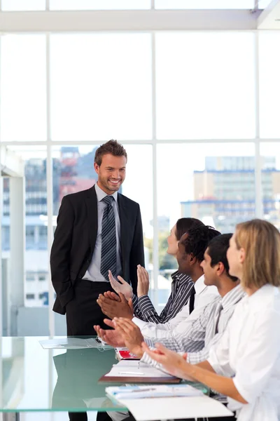 Happy businessman after giving a presentation with success — Stock Photo, Image