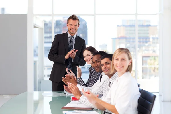 Happy business after a presentation — Stock Photo, Image