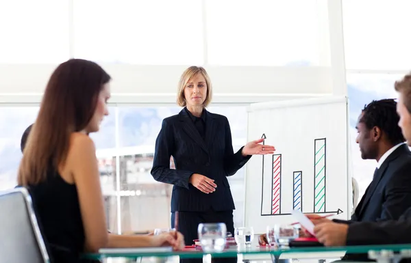Businesswoman interacting to her colleagues — Stock Photo, Image