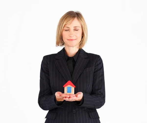 Mature woman dreaming of new house — Stock Photo, Image