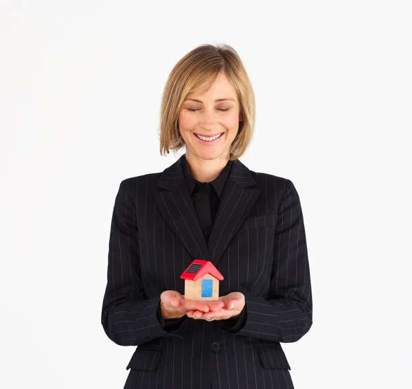 Well-dressed mature woman dreaming of new house — Stock Photo, Image