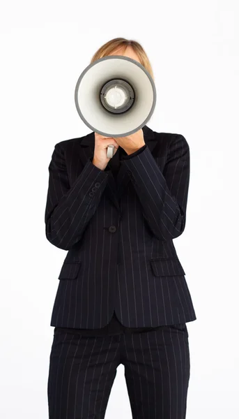 Businesswoman with a megaphone hiding her face — Stock Photo, Image