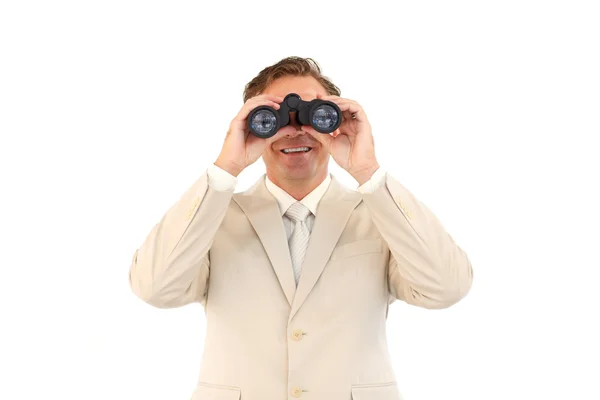 Amistoso hombre de negocios mirando a través de prismáticos —  Fotos de Stock