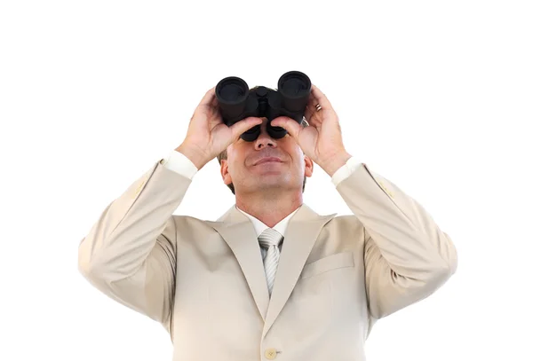 Hombre de negocios maduro sosteniendo prismáticos hacia arriba —  Fotos de Stock
