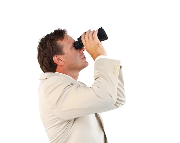 Attractive businessman holding binoculars — Stock Photo, Image