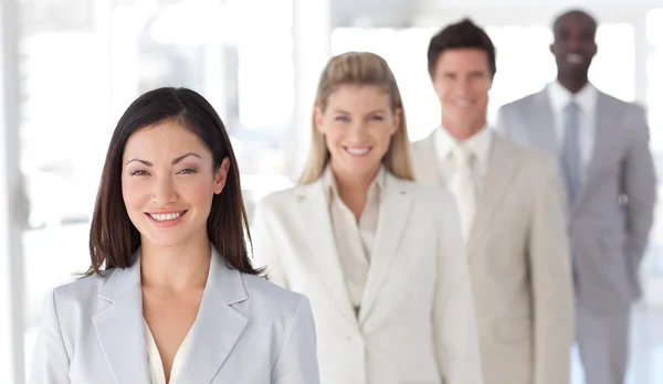 Business Group of Four looking at camera — Stock Photo, Image