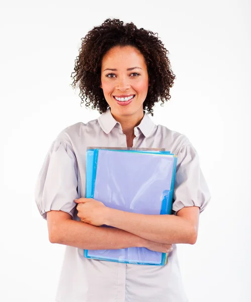 Businesswoman holding folders smiling at the camera — Stock Photo, Image