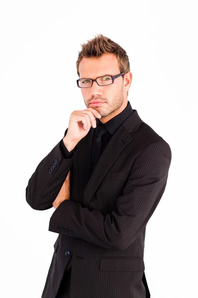 Confident businessman with glasses looking at the camera — Stock Photo, Image