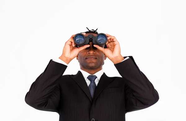 Joven hombre de negocios mirando a través de prismáticos —  Fotos de Stock
