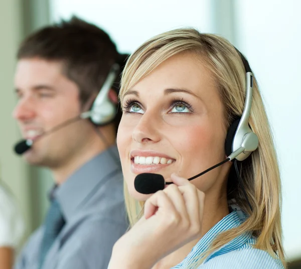 Two businesspeople with headsets — Stock Photo, Image