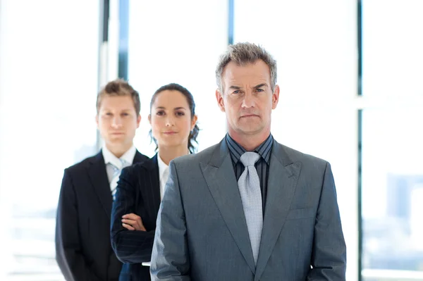 Businessman leading a business team — Stock Photo, Image