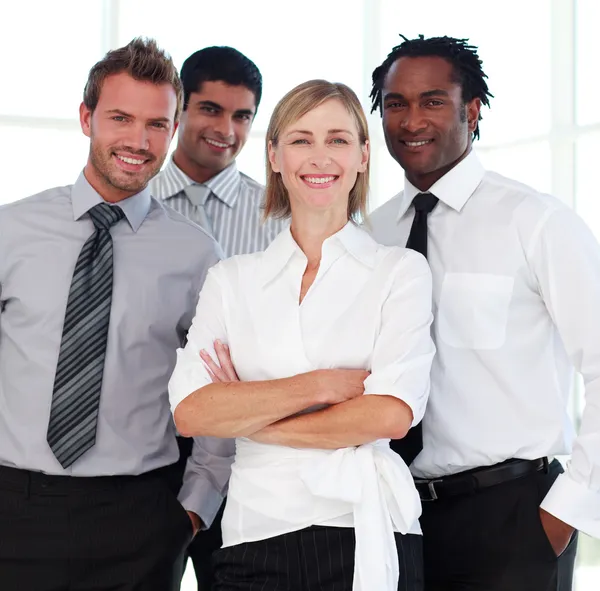 Business team smiling at the camera Stock Photo