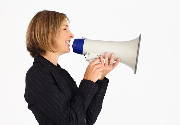 Profile of a smiling businesswoman with a megaphone Stock Image
