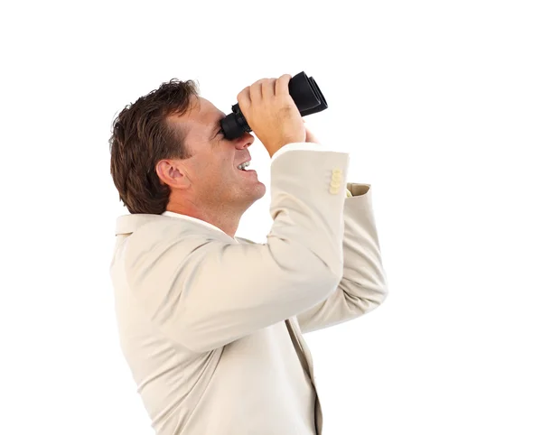 Handsome businessman searching for something with binoculars Royalty Free Stock Photos