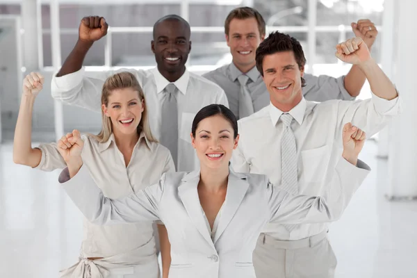 Business Team Smiling and Holding up Thumbs to camera Royalty Free Stock Images
