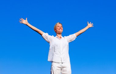 Happy woman feeling free with open arms clipart