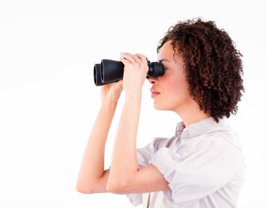 Portrait of attractive businesswoman using binoculars clipart