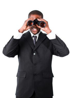 Handsome businessman looking through binoculars clipart