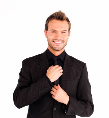 Attractive businessman corrects a tie clipart