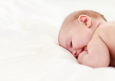 Baby sleeping in bed clipart