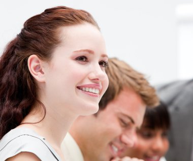 Portrait of a smiling businesswoman working clipart