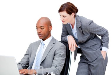 Business partners looking at the computer clipart