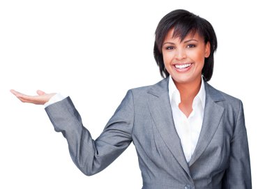 Hispanic businesswoman with open palm smiling at the camera clipart