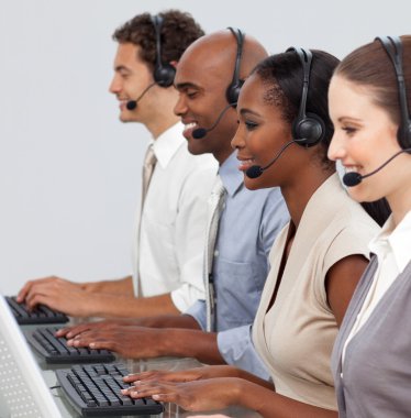 Customer business representatives at their computer clipart