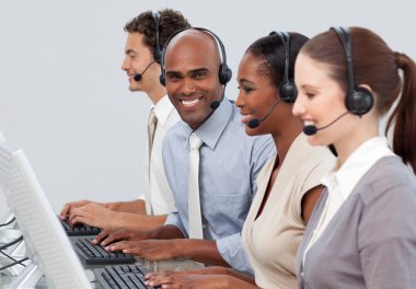 A diverse business group with headset on clipart