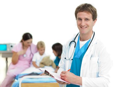 Portrait of a smiling doctor examining a patient's folder clipart