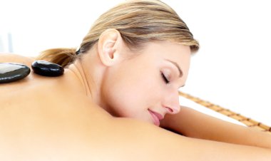 Happy woman having a massage clipart