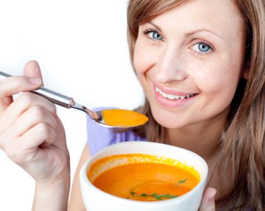 Hungry woman holding a soup bowl clipart