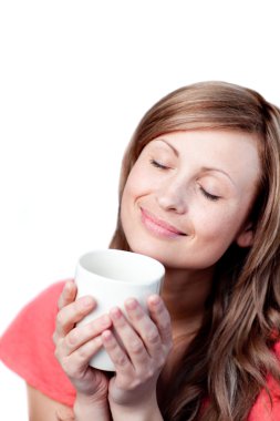 Beautiful woman drinking a cup of tea clipart