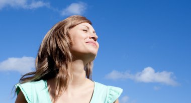 Portrait of a caucasian woman relaxing outdoor clipart