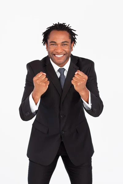 Uomo d'affari sorridente con pugno — Foto Stock