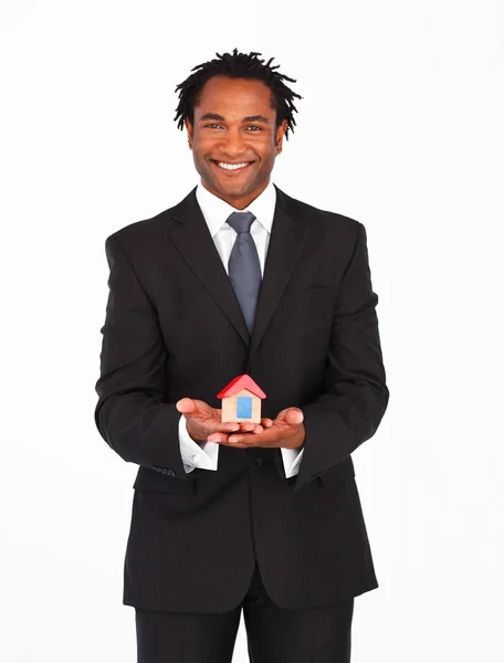 Afro-american businessman presenting housing solution — Stock Photo, Image