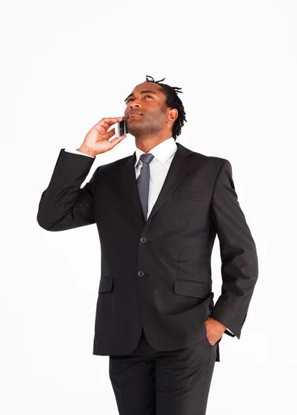 Businessman talking on the phone looking upwards — Stock Photo, Image