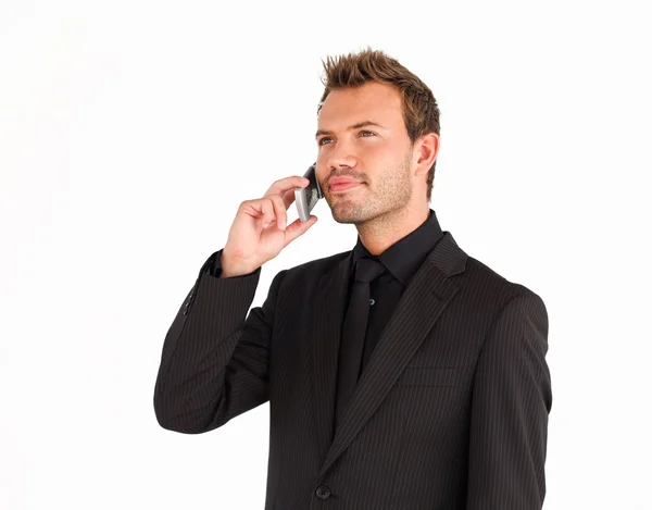 Empresário sério atraente falando ao telefone — Fotografia de Stock