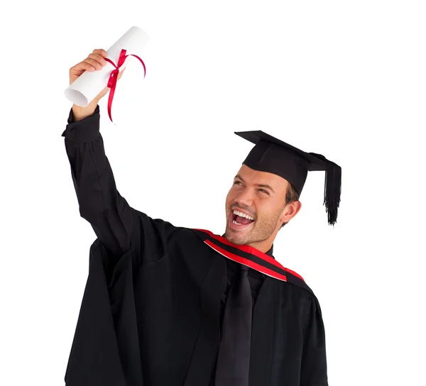 Excited boy celebrating his graduation — Stock Photo, Image