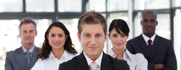 Smiling business manager leading his team — Stock Photo, Image
