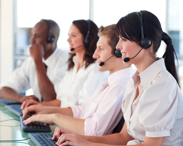 Young with a headset on working — Stock Photo, Image